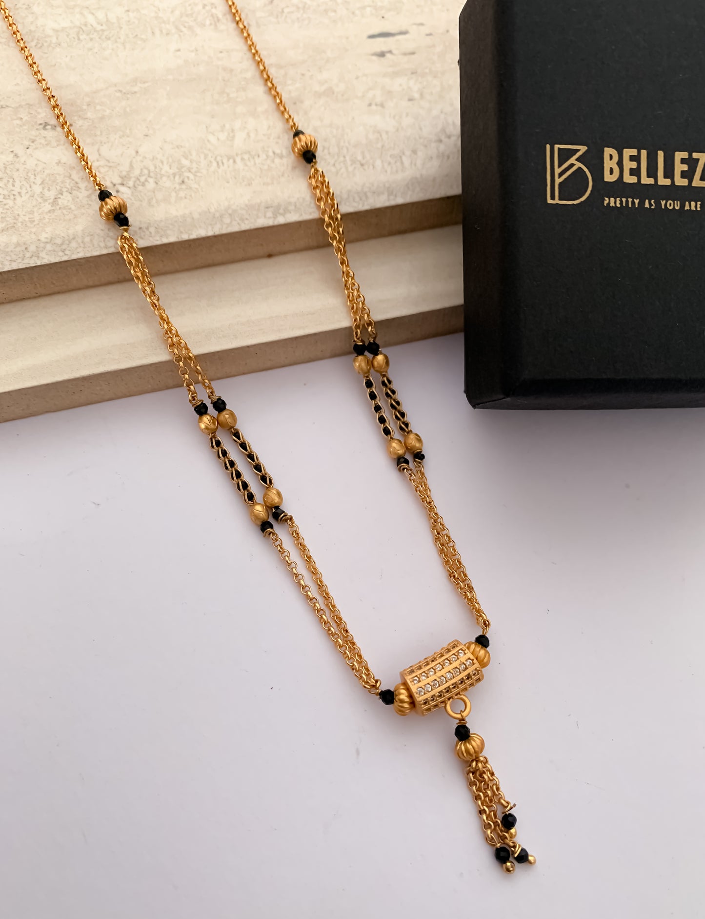 Buy 1 Get 1 Free American Diamond Matt Finished Original Gold Look Hanging fancy Delicate Mangalsutra - Mangalsutra - Belleza Jewels