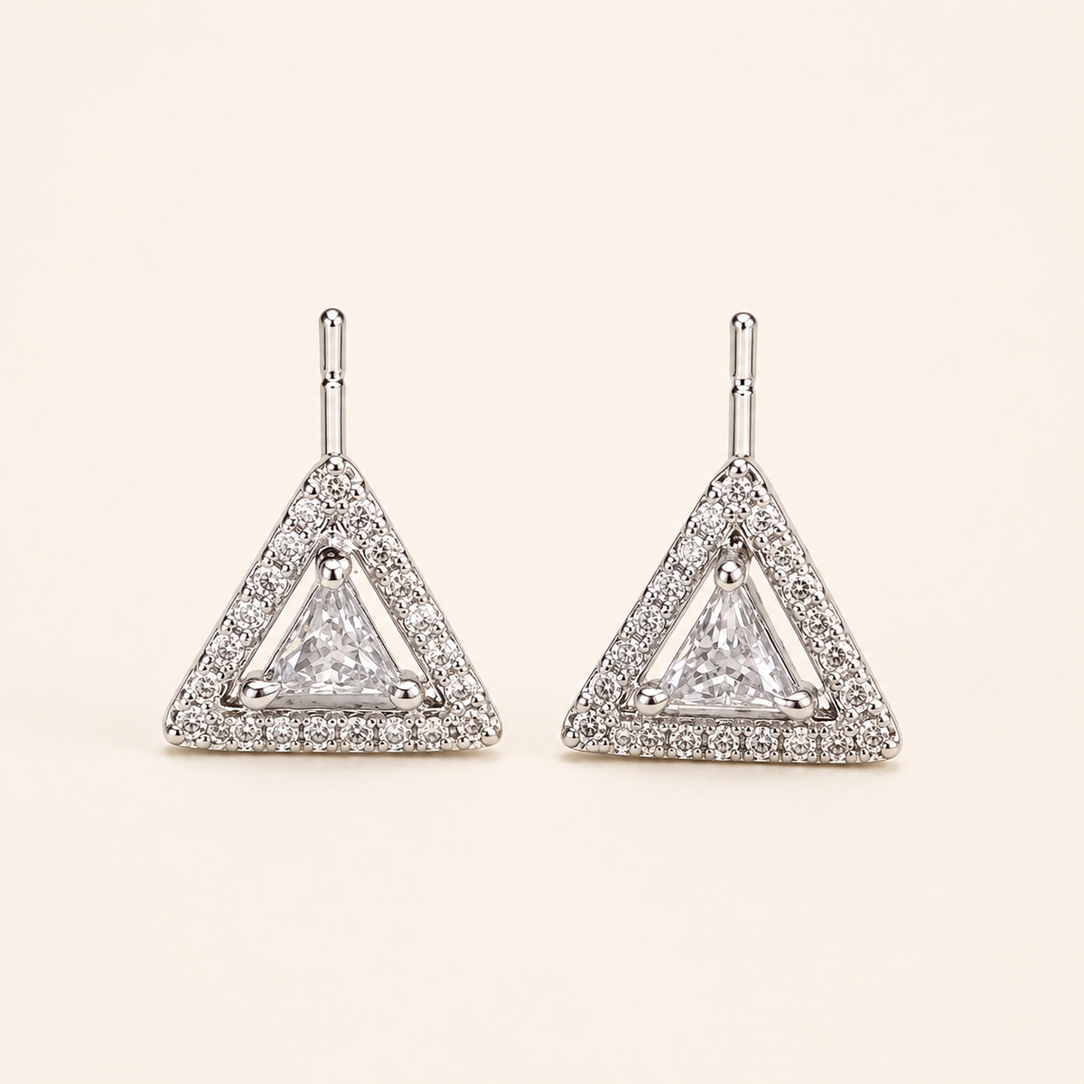 American Diamond silver triangular stud earrings, warm ivory hero view