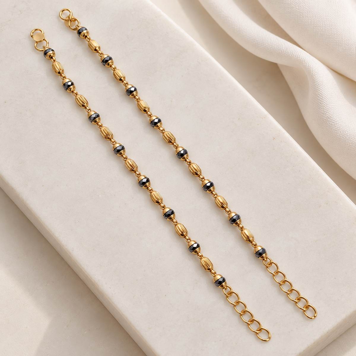 Fancy Black Beads with Textured Golden Oval Bead Najariya Bracelet