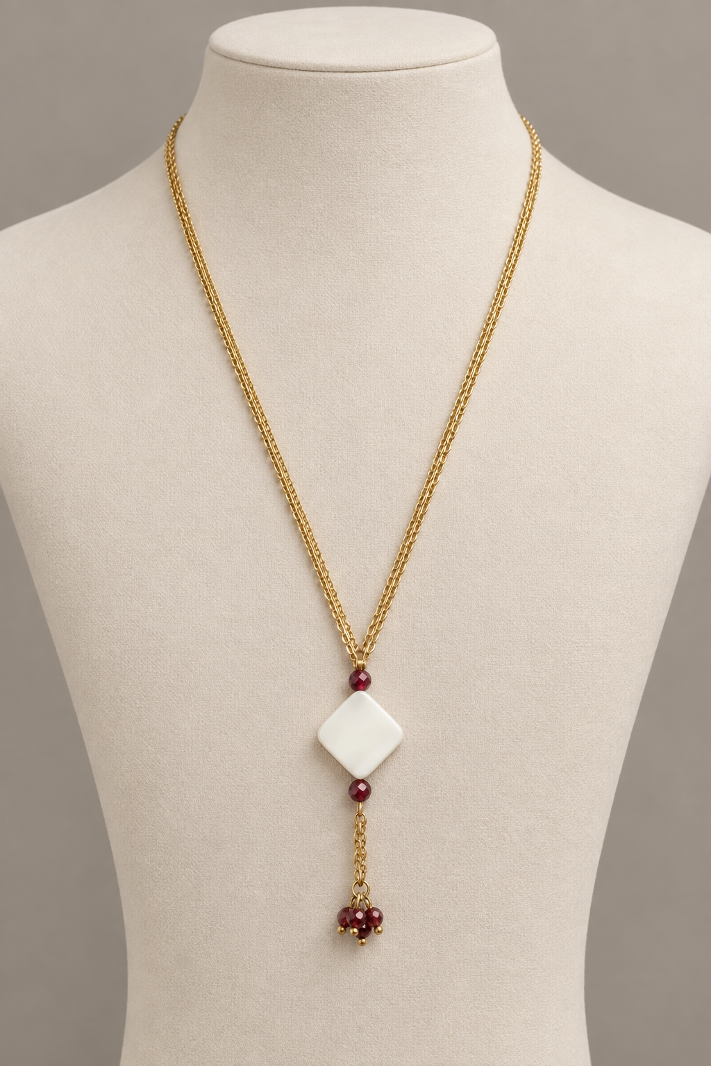 2965 necklace on an ivory jewellery bust