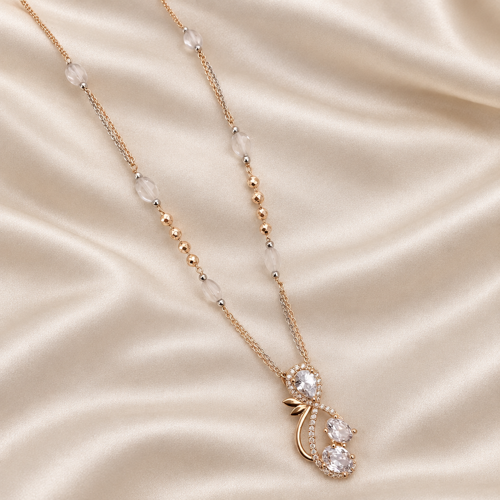necklace flat lay on champagne satin