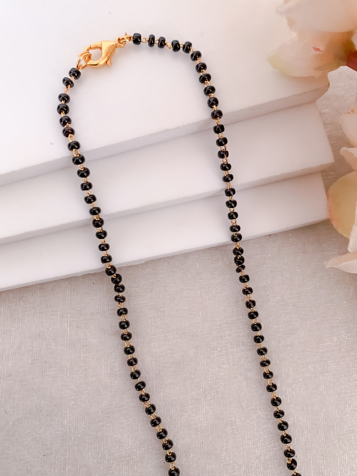 Buy 1 Get 1 Free -Asymmetrical Triple Layer Black Beads Mangalsutra with Star Motif - Mangalsutra - Belleza Jewels