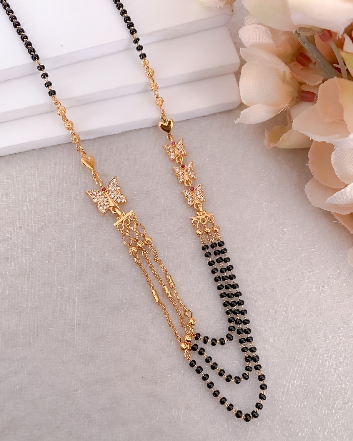 Buy 1 Get 1 Free -Asymmetrical Triple Layer Black Beads Mangalsutra with Star Motif - Mangalsutra - Belleza Jewels