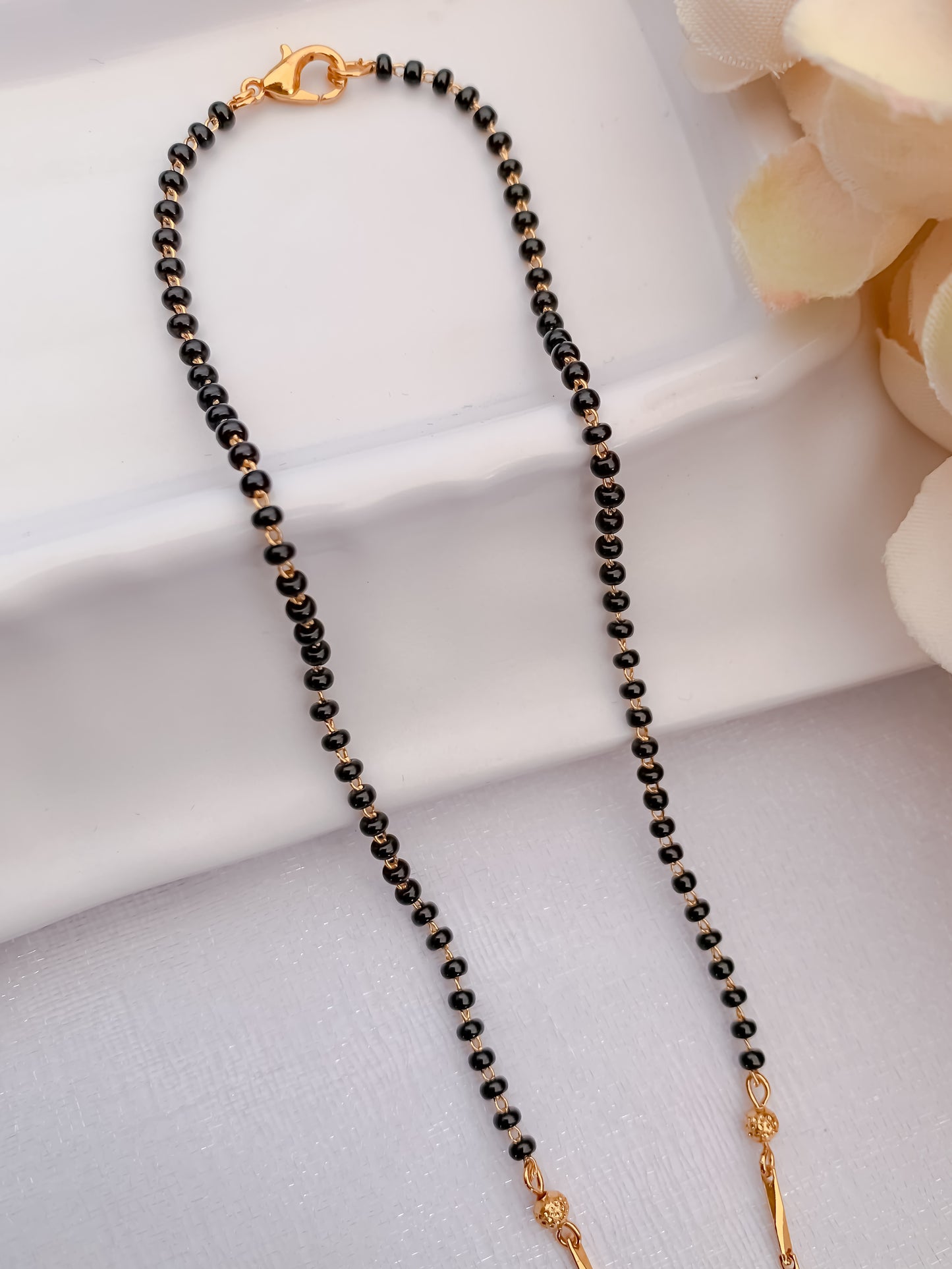 Buy 1 Get 1 Free - American Diamond Gold Plated Oval Shape Hanging Mangalsutra