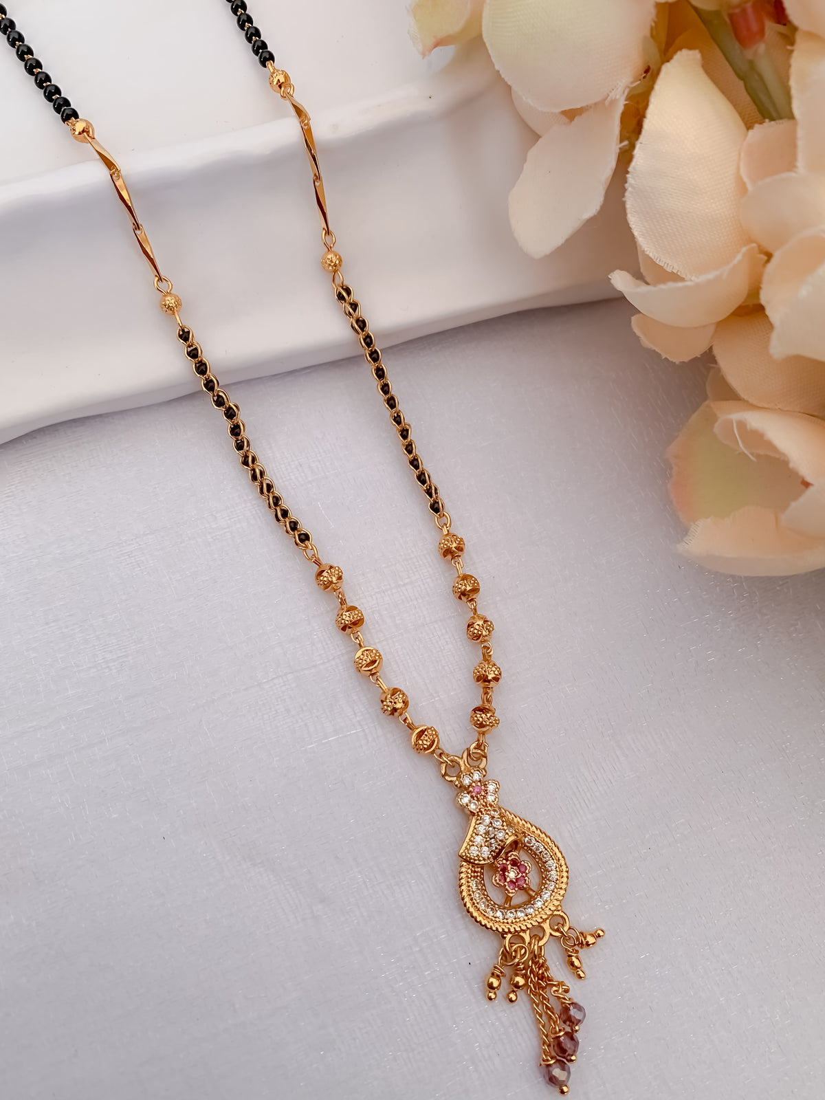 Buy 1 Get 1 Free - American Diamond Gold Plated Oval Shape Hanging Mangalsutra - Mangalsutra - Belleza Jewels