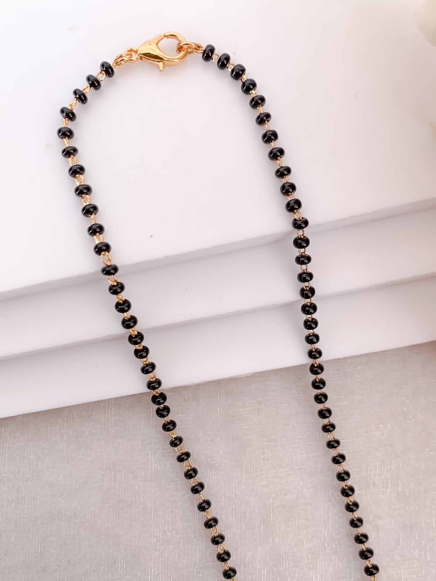 Buy 1 Get 1 Free - Minimal Bow Design Diamond Style Black Beads Mangalsutra - Mangalsutra - Belleza Jewels