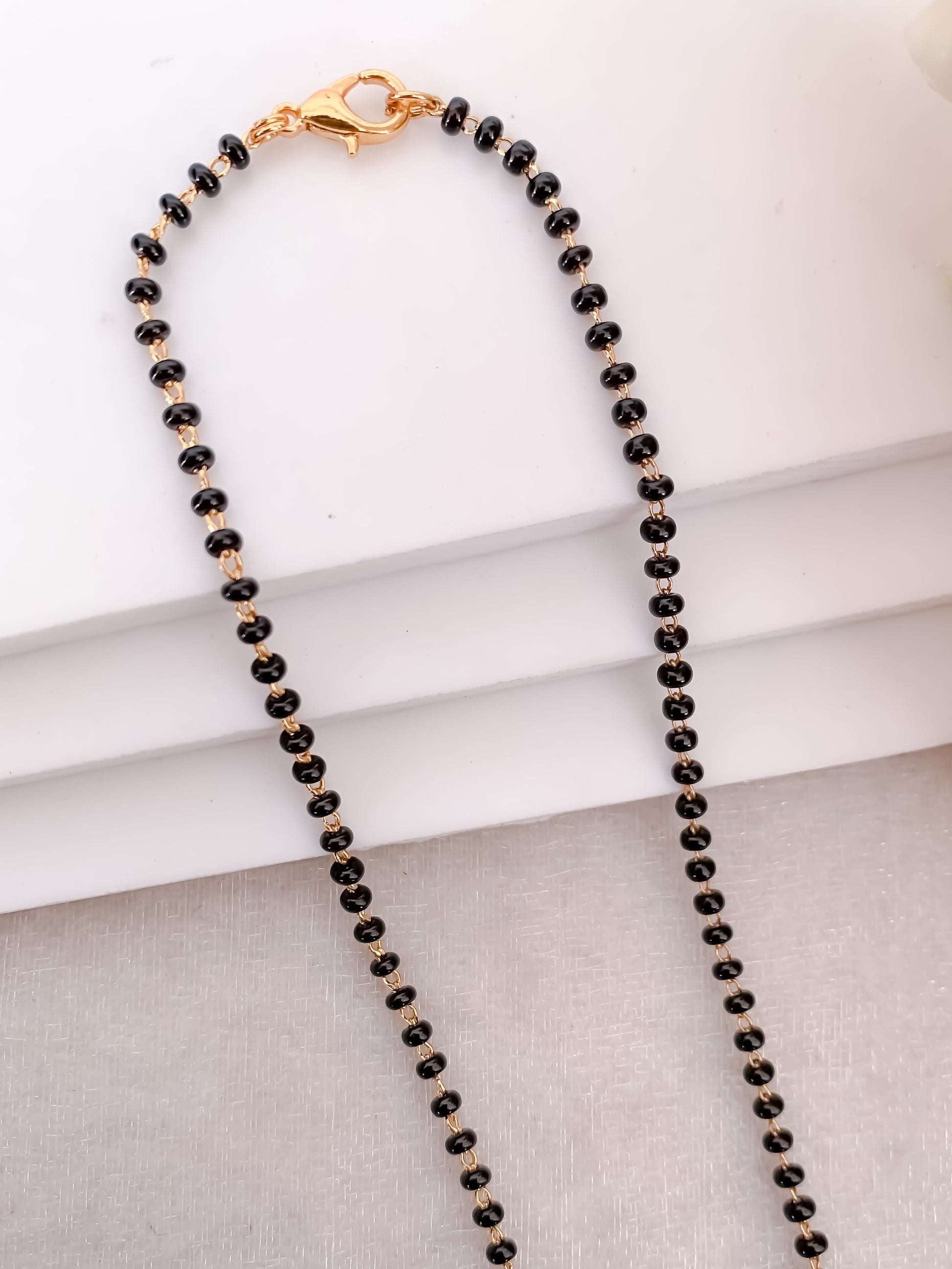 Buy 1 Get 1 Free - Minimal Bow Design Diamond Style Black Beads Mangalsutra - Mangalsutra - Belleza Jewels
