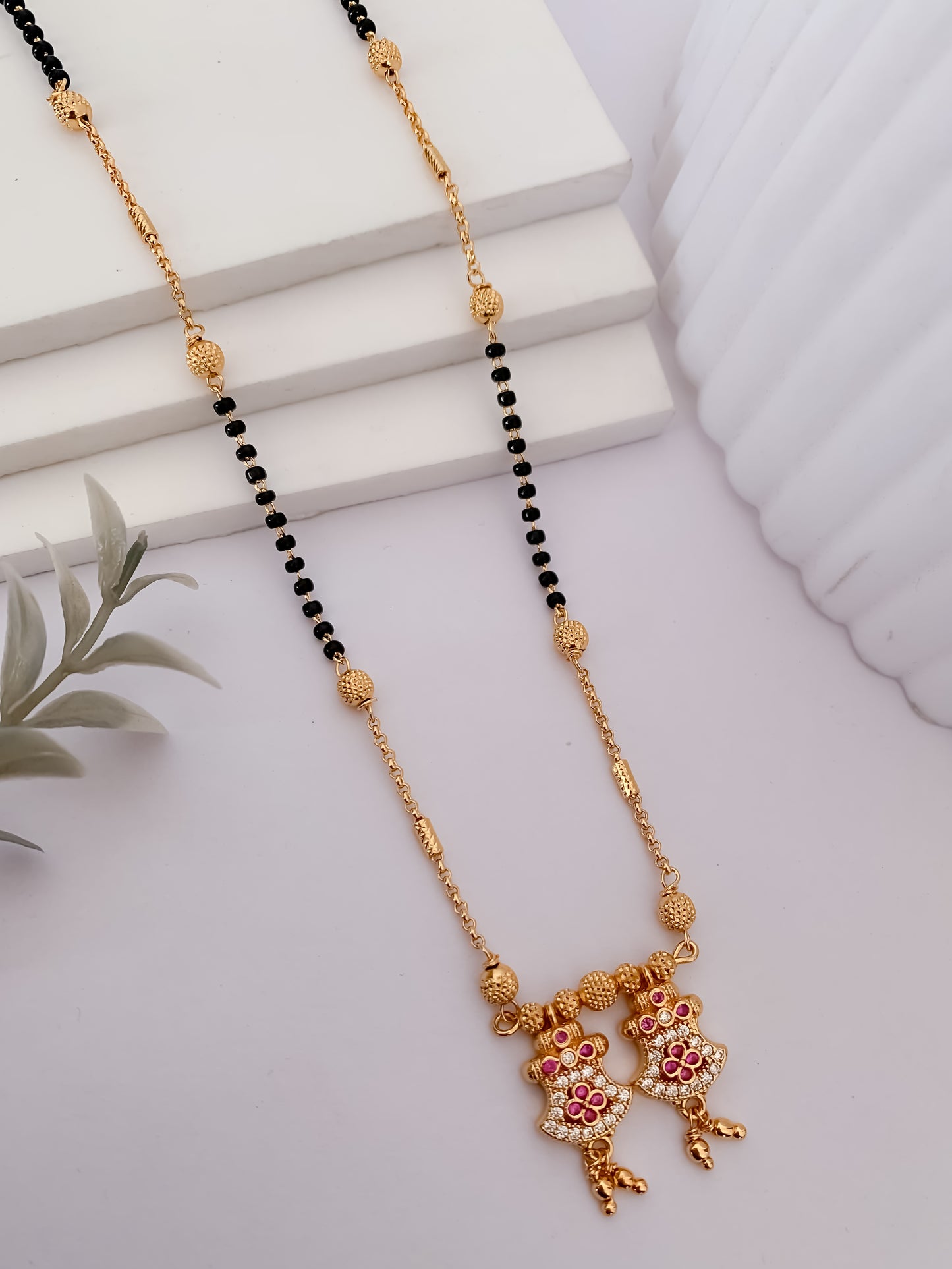 Buy 1 Get 1 Free -Twin Motif Antique Gold Black Beads Mangalsutra
