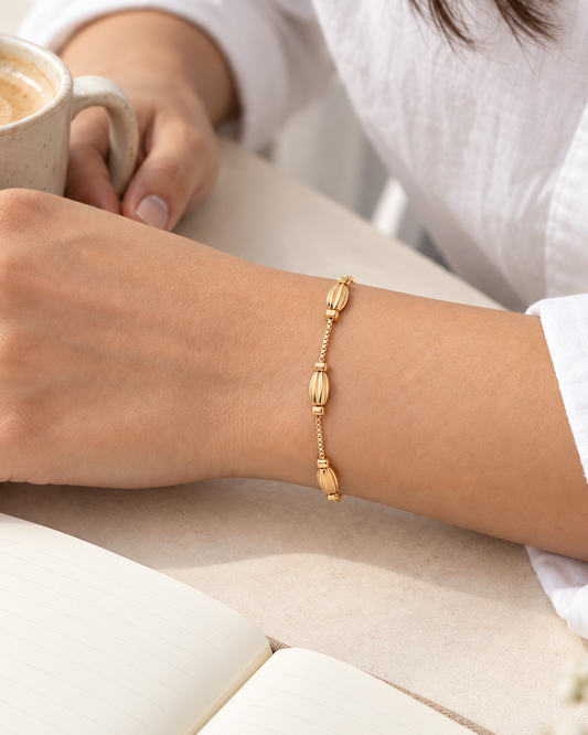 Sculpted Oval Charm Gold-Tone Bracelet