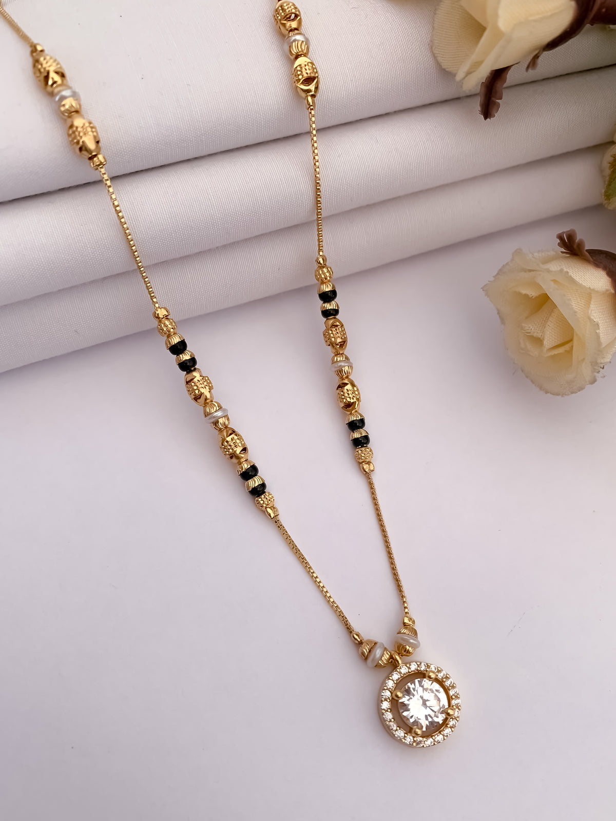 Buy 1 Get 1 Free -Classic Round Solitaire Crystal Gold Finish Black Bead Mangalsutra - Mangalsutra - Belleza Jewels