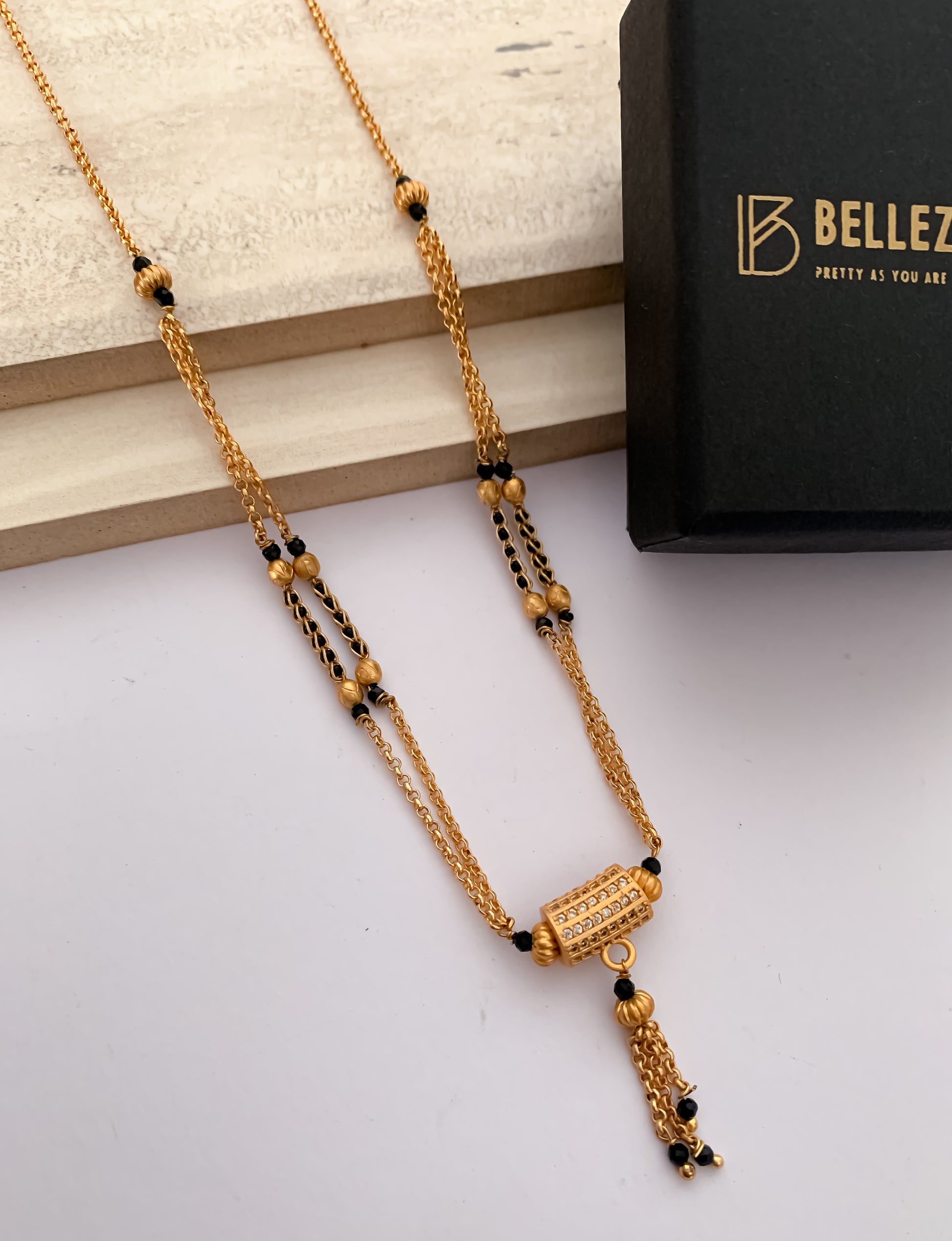 Buy 1 Get 1 Free American Diamond Matt Finished Original Gold Look Hanging fancy Delicate Mangalsutra - Mangalsutra - Belleza Jewels