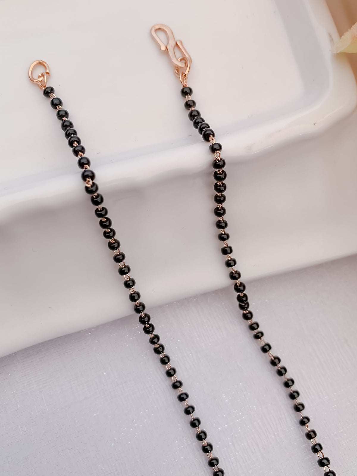 Buy 1 Get 1 Free -Minimal Gold Plated Black Bead Mangalsutra with Crystal Floral Center - Mangalsutra - Belleza Jewels