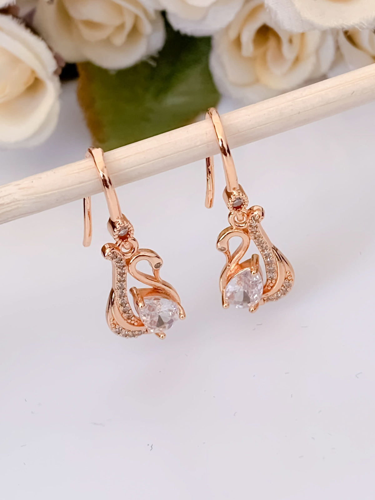 BUY 1 GET 1 FREE -American Diamond Rose Gold Swan Shape Hanging Fancy Earrings - Earrings - Belleza Jewels