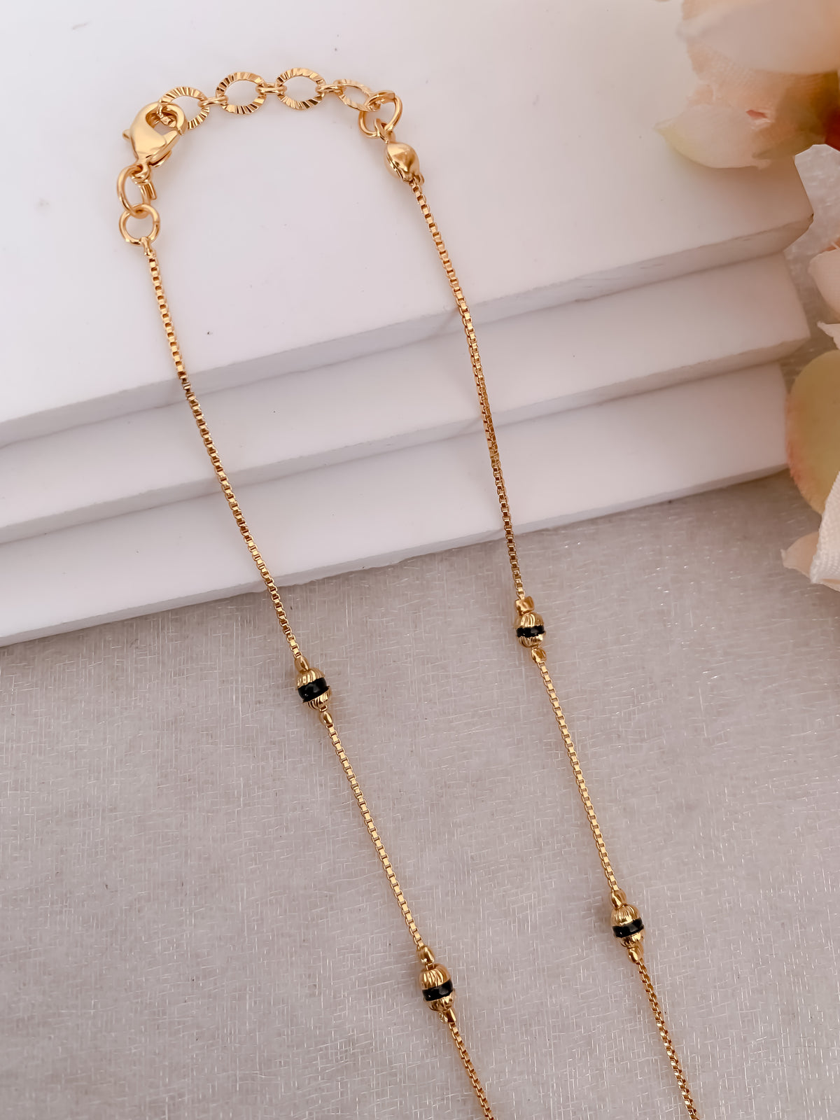 Star Bloom Oval CZ Mangalsutra | Gold Finish Black Beads Necklace