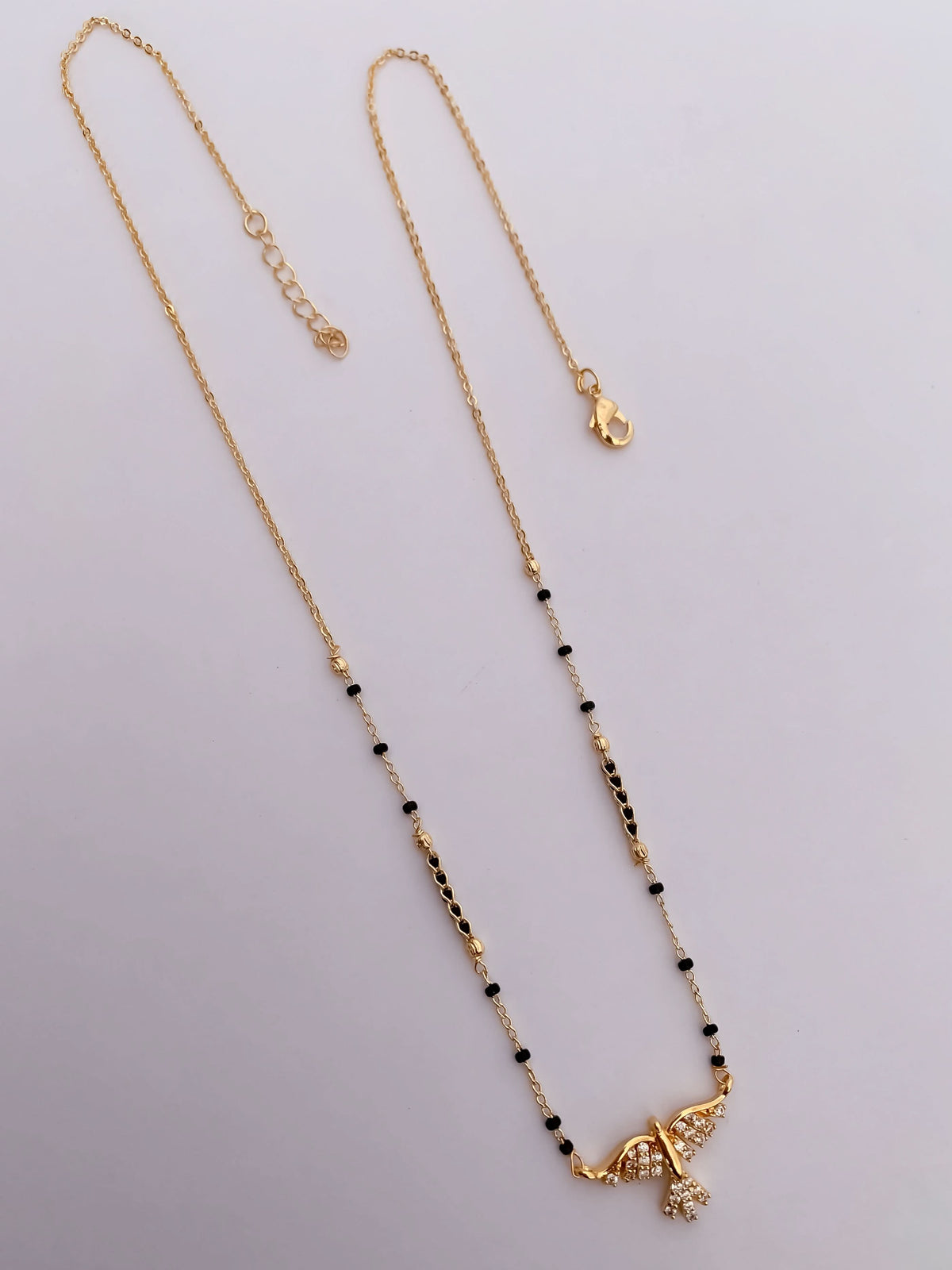 Buy 1 Get 1 Free - Gold Finish Winged CZ Drop Mangalsutra - Mangalsutra - Belleza Jewels