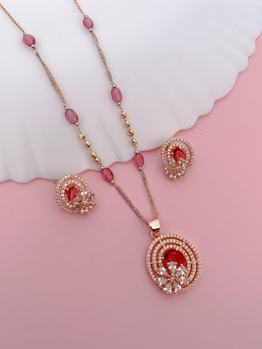 Rose Gold Finish Ruby Oval Pendant Necklace Set with Matching Stud Earrings