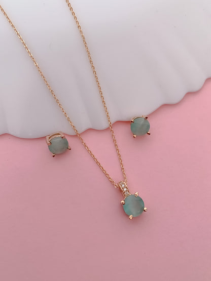 Elegant Aqua Stone Pendant Set in Rose Gold Finish