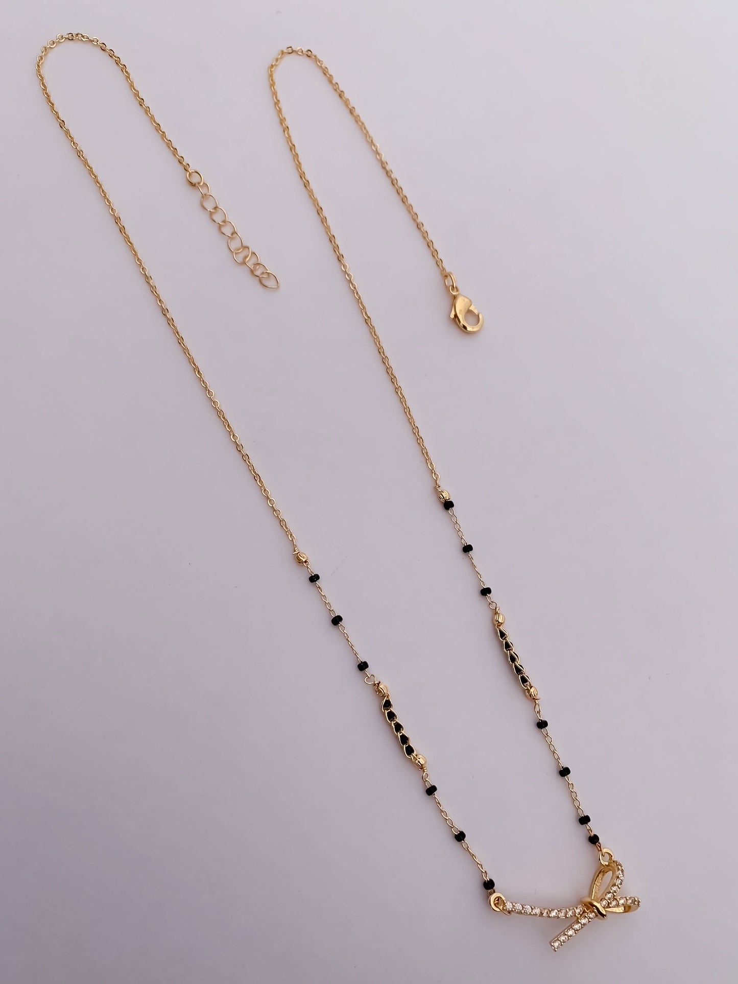 BUY 1 GET 1 FREE - American Diamond rose gold plated fancy Mangalsutra