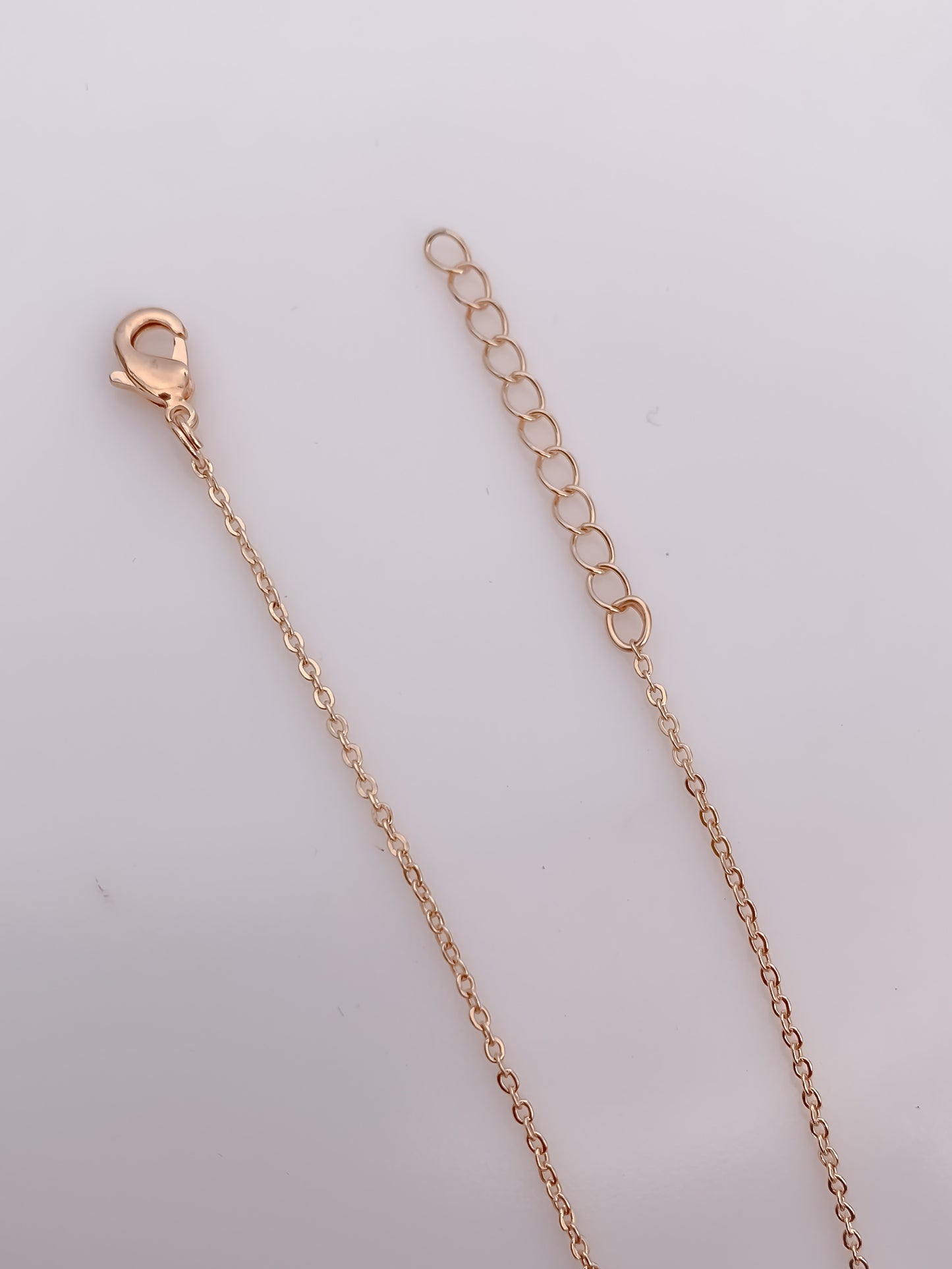 Elegant Aqua Stone Pendant Set in Rose Gold Finish