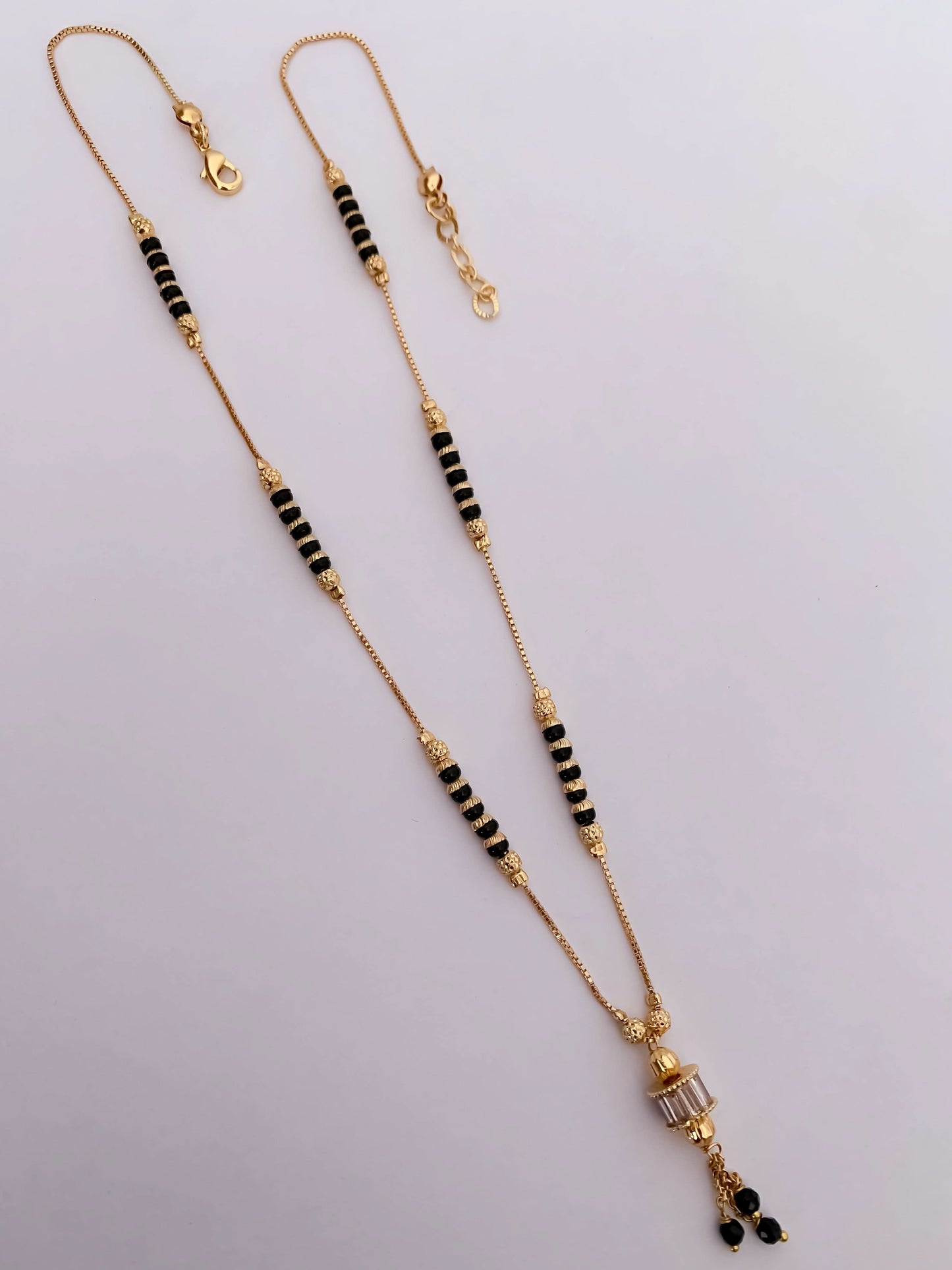 BUY 1 GET 1 FREE -  Fancy Chowki Diamond Golden Hanging Delicate Mangalsutra
