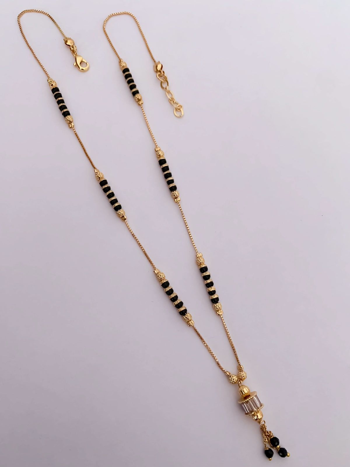 Buy 1 Get 1 Free -Gold Finish Baguette CZ Drop Mangalsutra - Mangalsutra - Belleza Jewels
