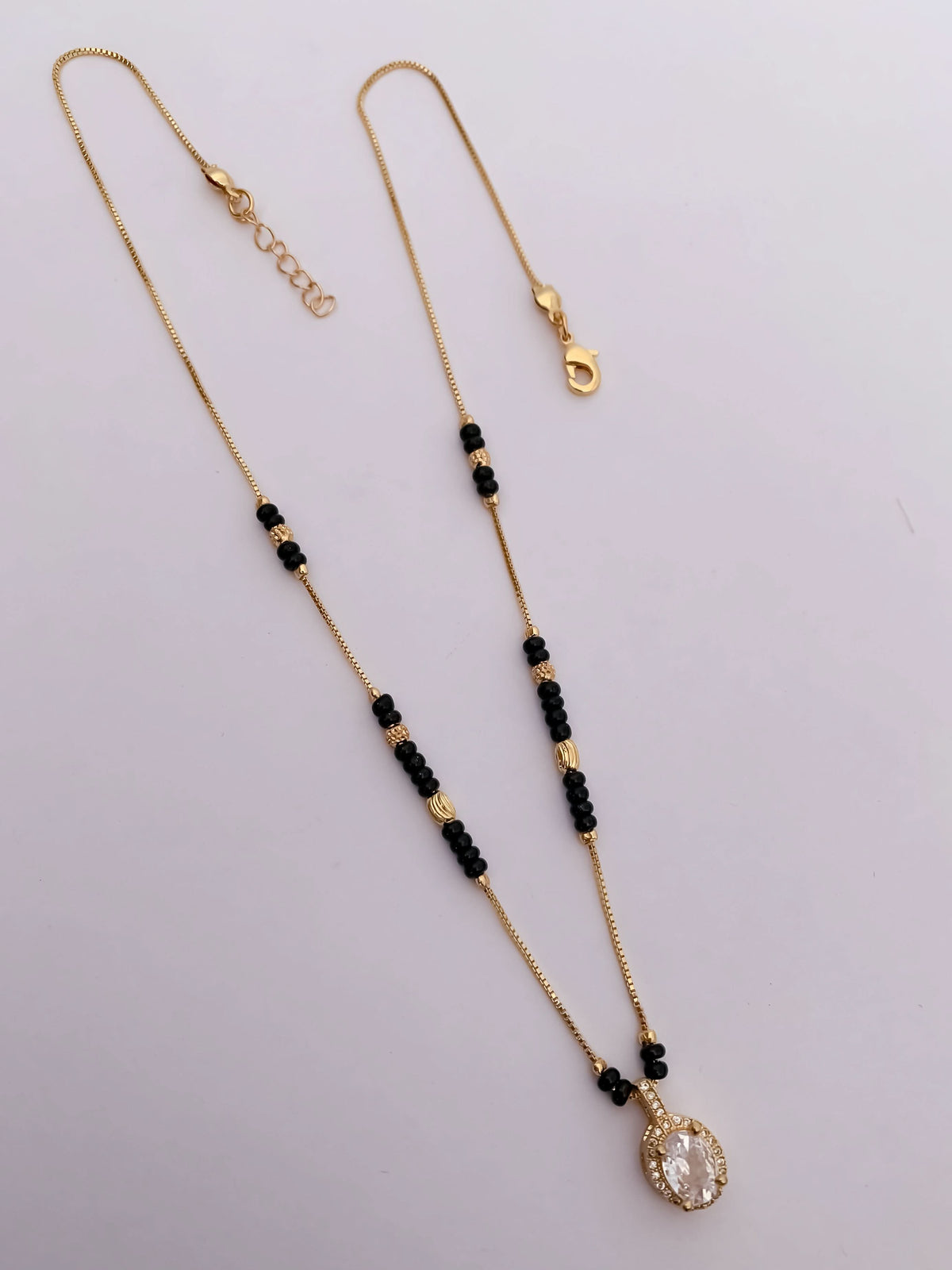 Buy 1 Get 1 Free -Gold Finish Oval CZ Drop Mangalsutra - Mangalsutra - Belleza Jewels