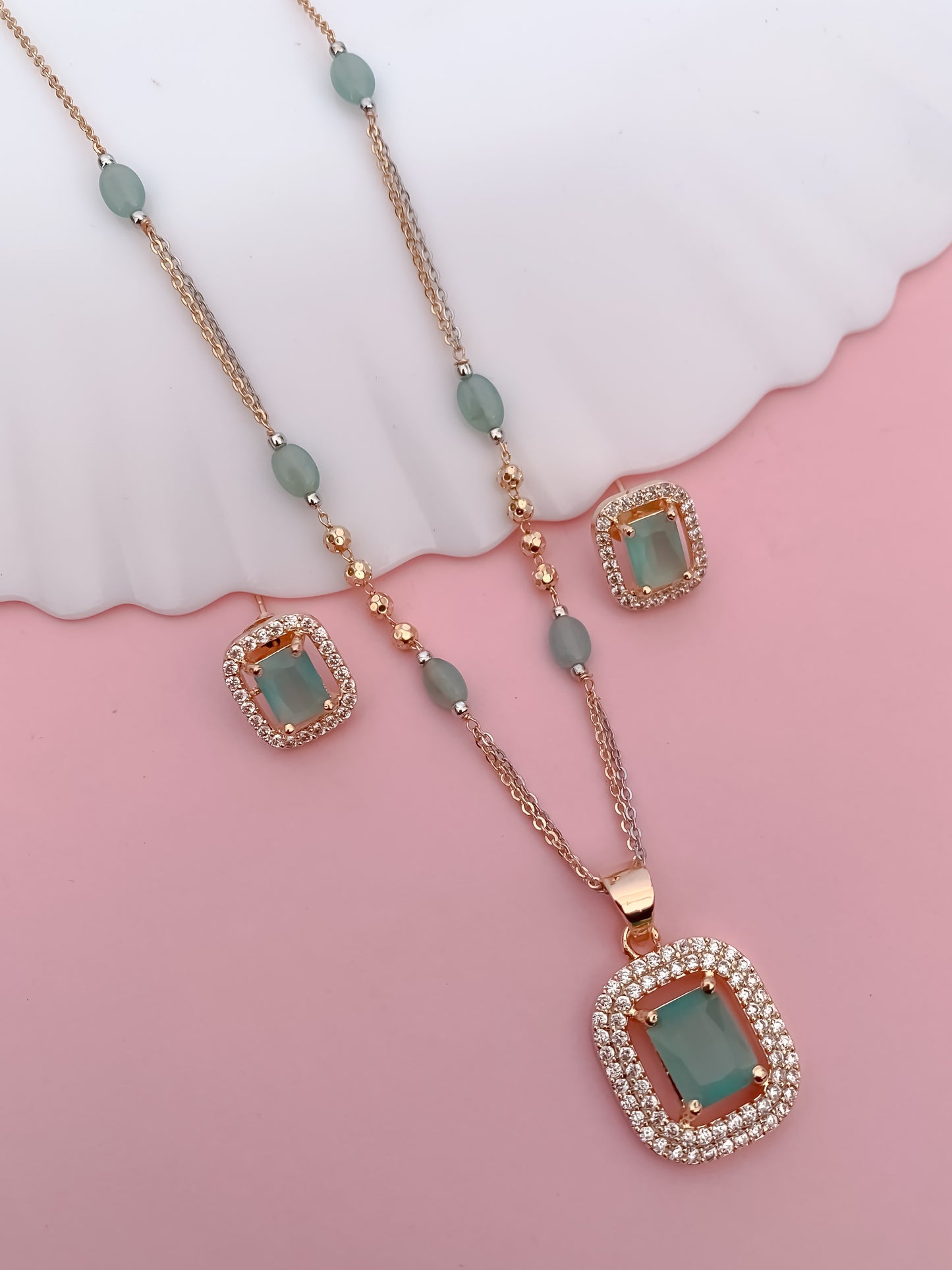 Elegant Aqua Stone Pendant Set with Matching Earrings