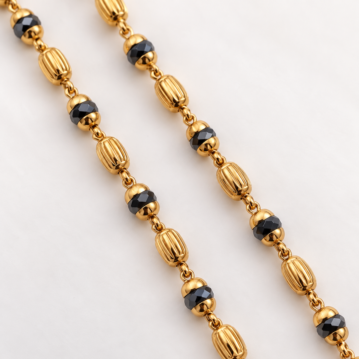 Fancy Black Beads with Textured Golden Oval Bead Najariya Bracelet