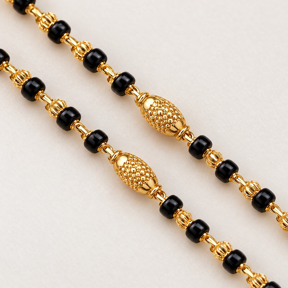 Fancy Black Beads with Textured Gold Ball Design Najariya Bracelet