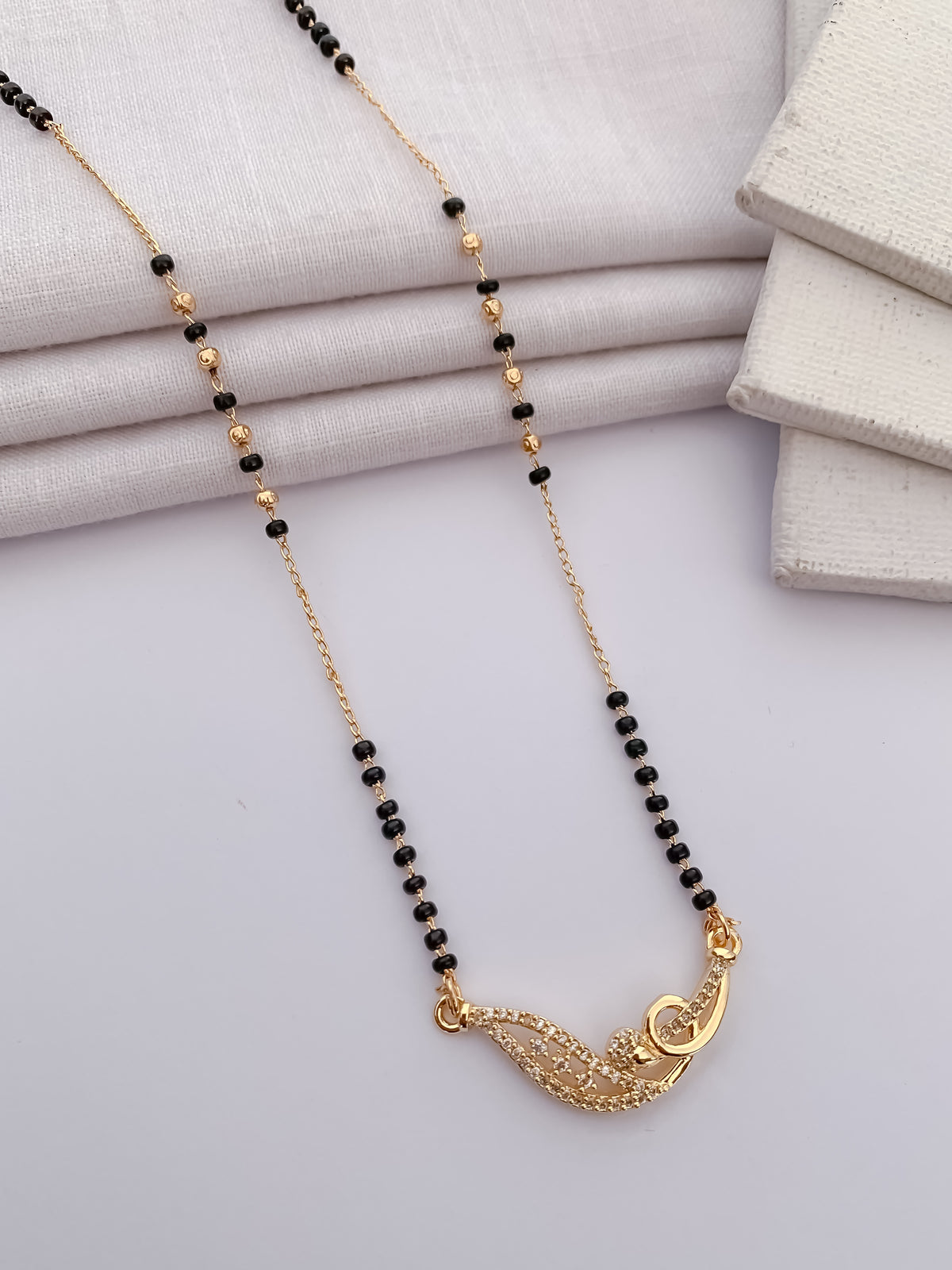 Leaf Curve Black Bead Mangalsutra with Crystal Detail