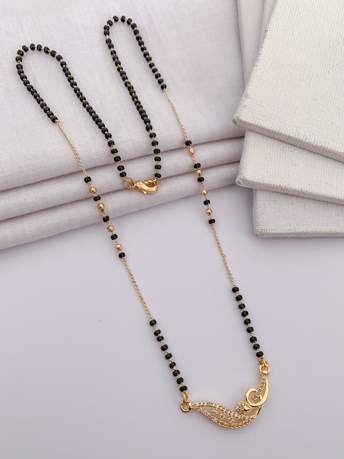 Leaf Curve Black Bead Mangalsutra with Crystal Detail