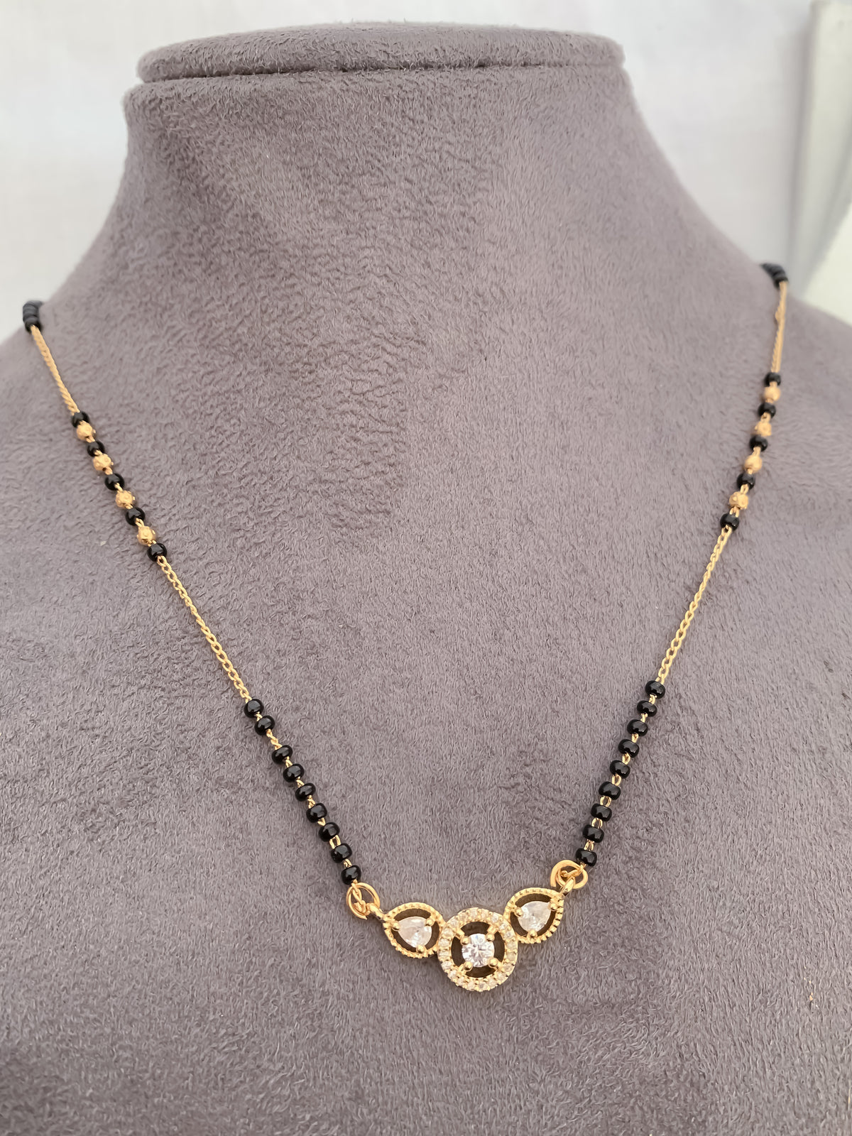 Triple Solitaire Black Bead Mangalsutra with Teardrop Halo Pendant