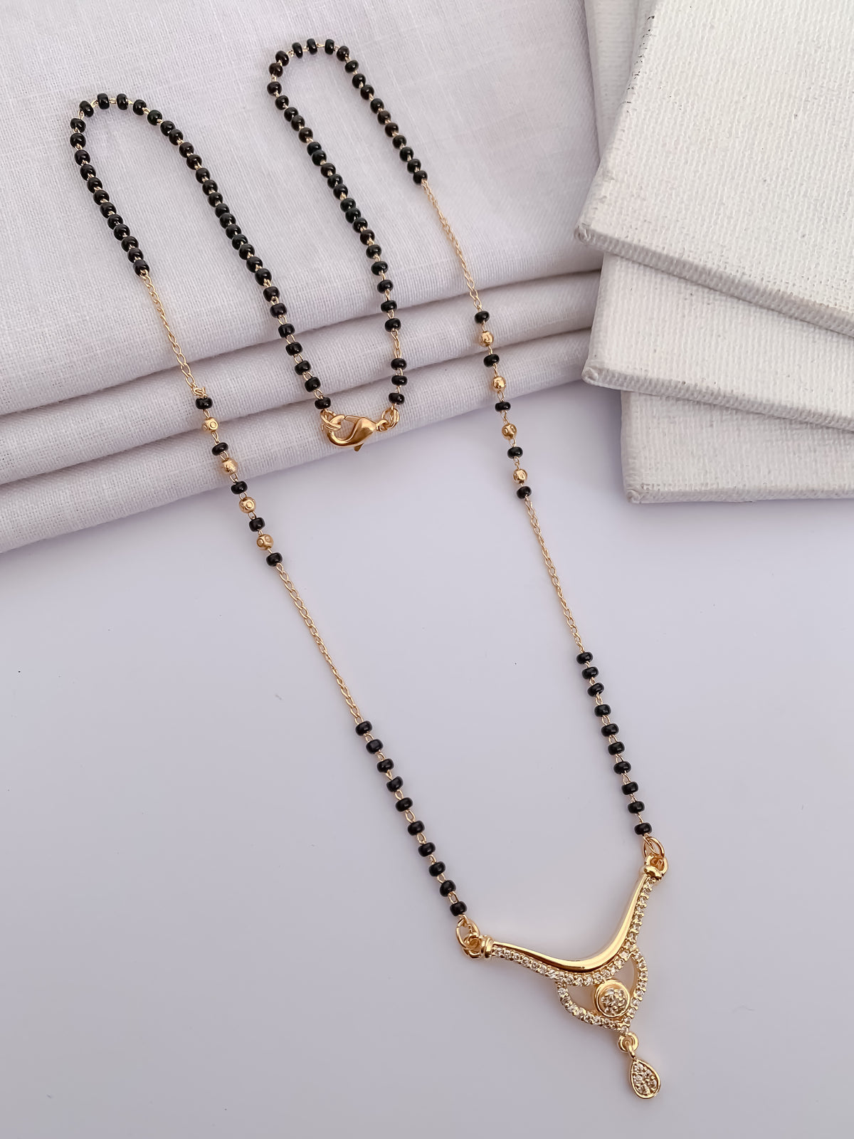 Curved Solitaire Black Bead Mangalsutra with Teardrop Charm