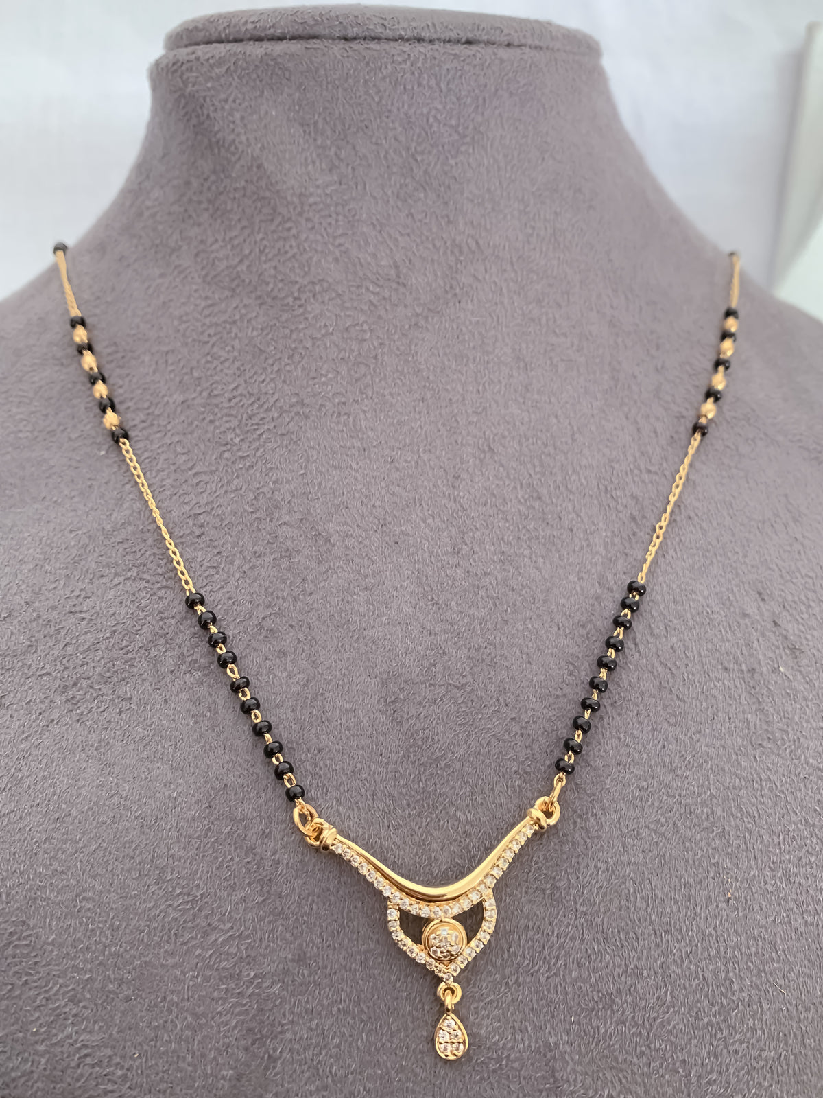 Curved Solitaire Black Bead Mangalsutra with Teardrop Charm