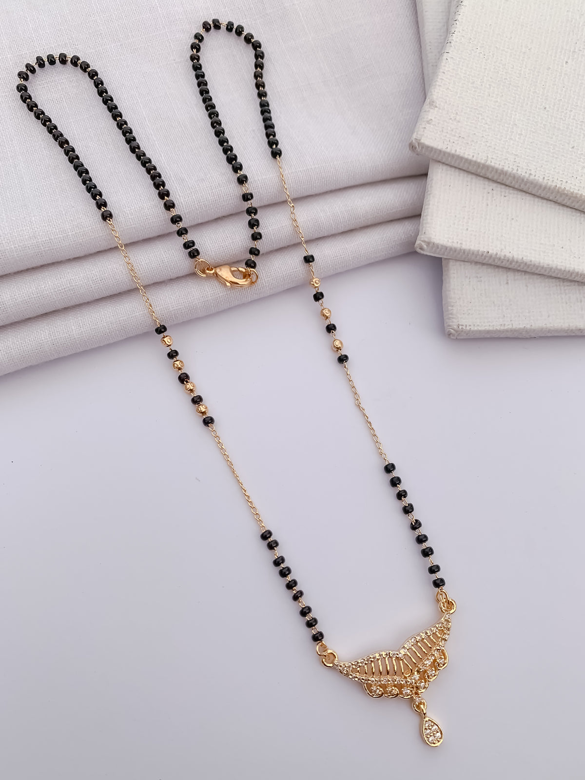 Crescent Ladder Black Bead Mangalsutra with Teardrop Charm