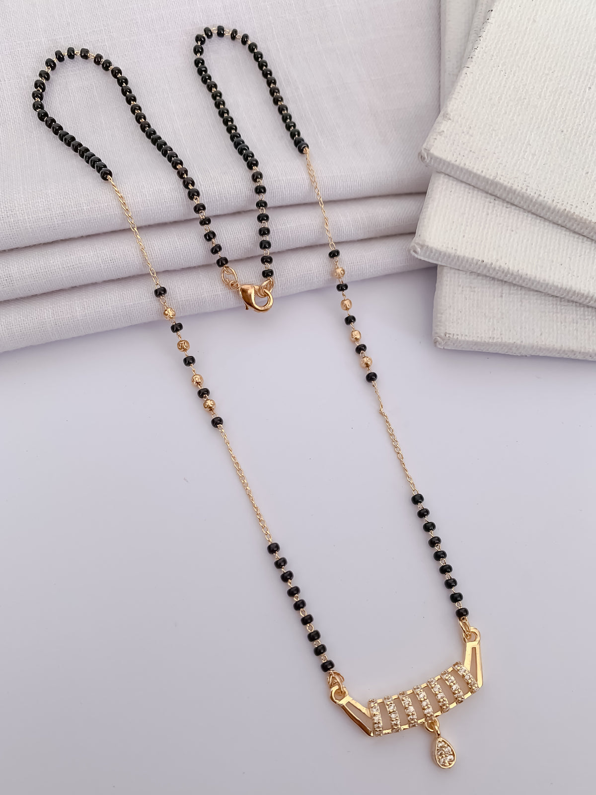 Ladder Curve Black Bead Mangalsutra with Teardrop Charm