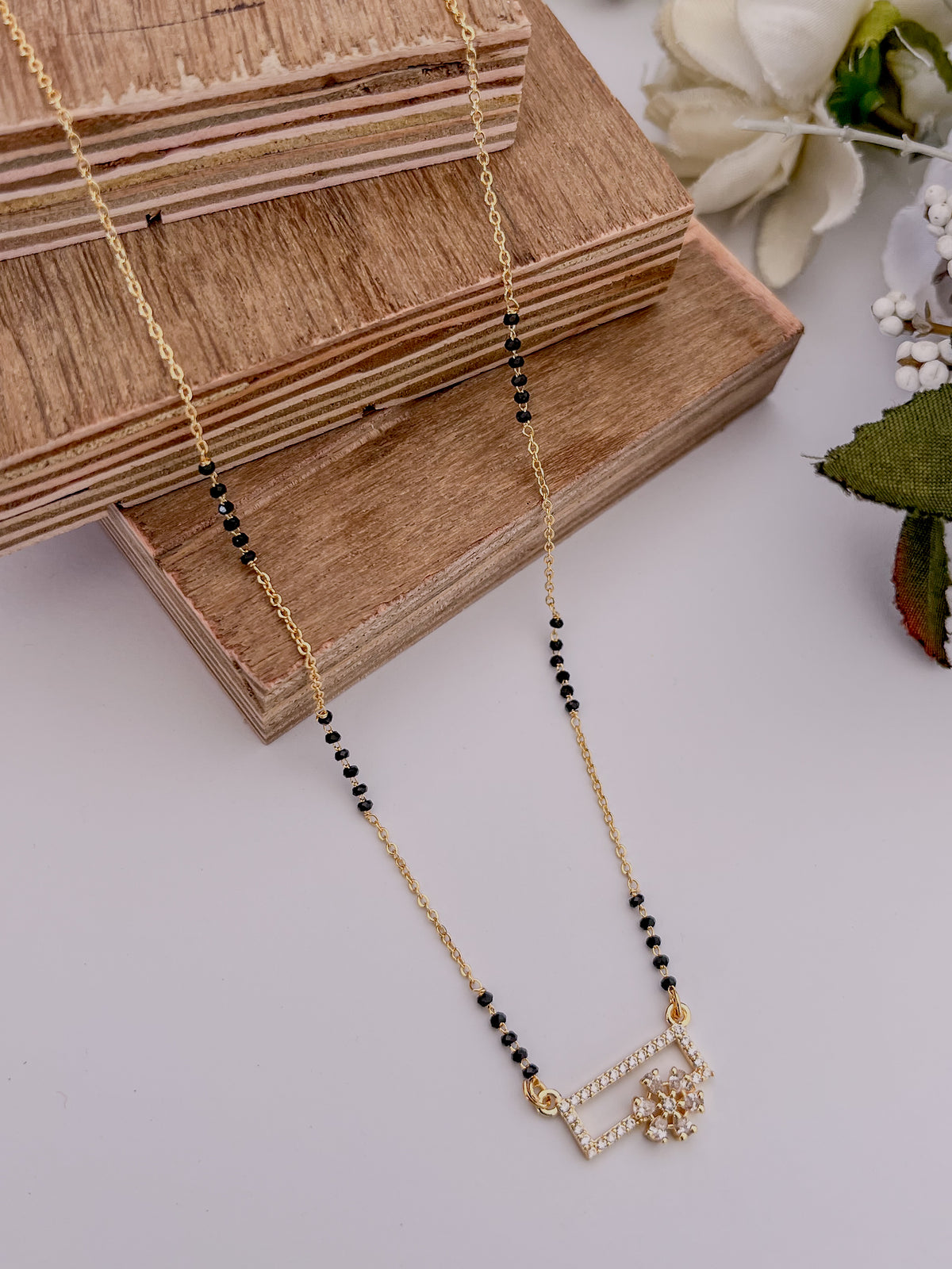 Geometric Floral Black Bead Mangalsutra with Crystal Square Pendant
