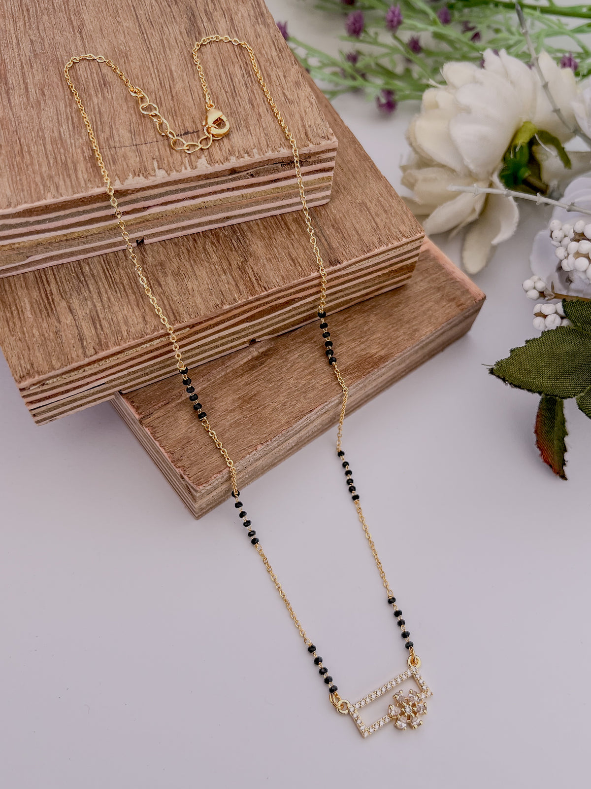 Geometric Floral Black Bead Mangalsutra with Crystal Square Pendant