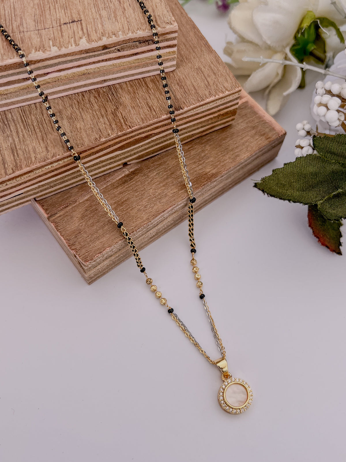 Two-Tone Round Halo Black Bead Mangalsutra with Pearl-Look Centre