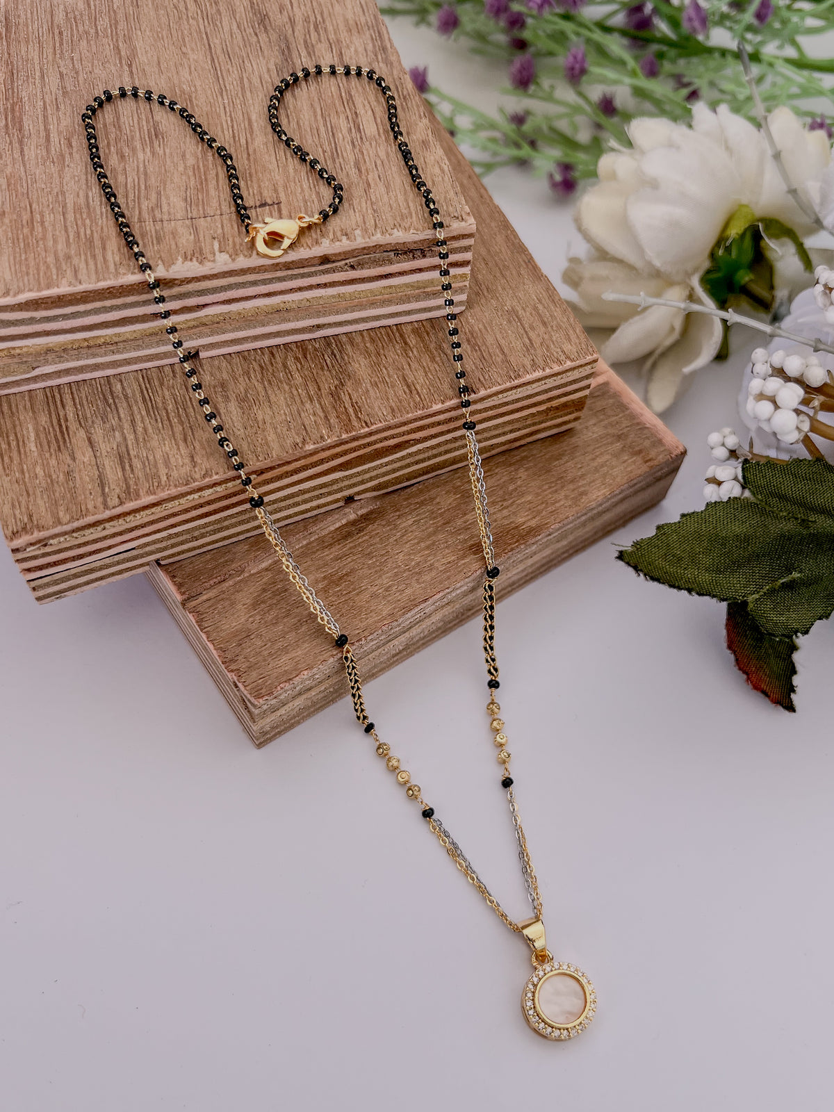 Two-Tone Round Halo Black Bead Mangalsutra with Pearl-Look Centre
