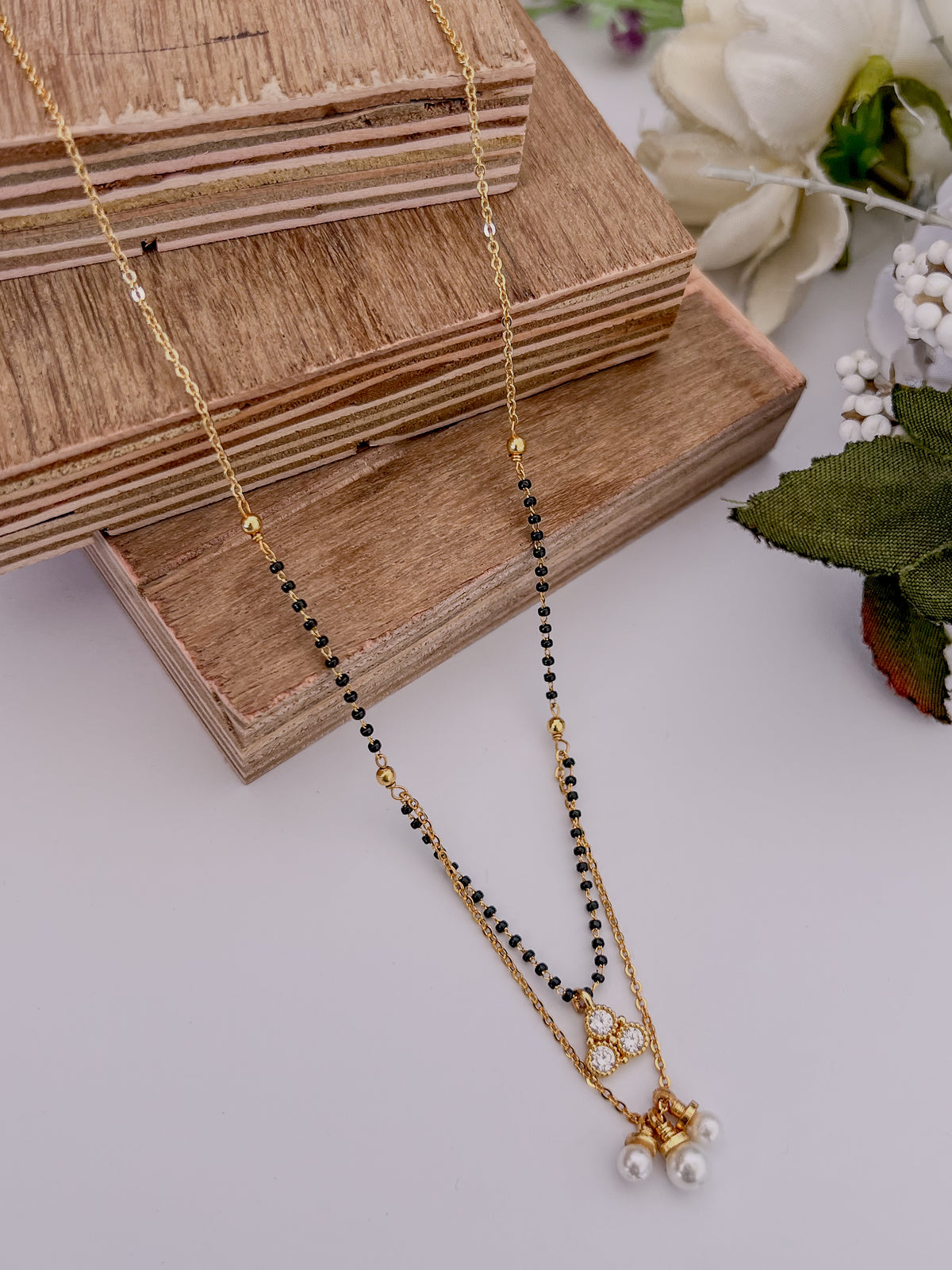 Layered Pearl Drop Black Bead Mangalsutra with Triple Halo Pendant