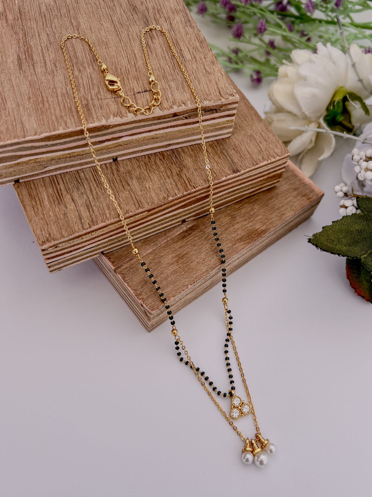 Layered Pearl Drop Black Bead Mangalsutra with Triple Halo Pendant