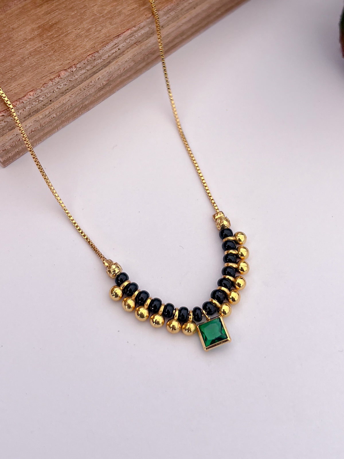 Emerald Square Stone Black Bead Mangalsutra with Beaded Centre