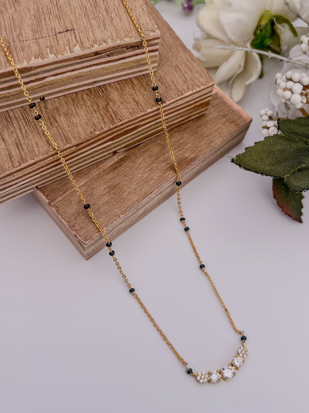 Five-Stone Black Bead Mangalsutra with Graduated Solitaire Centre
