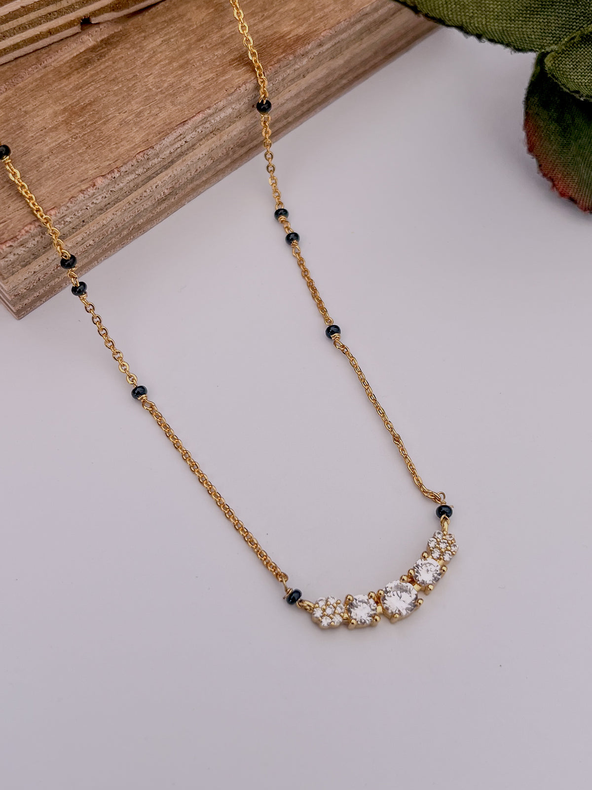 Five-Stone Black Bead Mangalsutra with Graduated Solitaire Centre