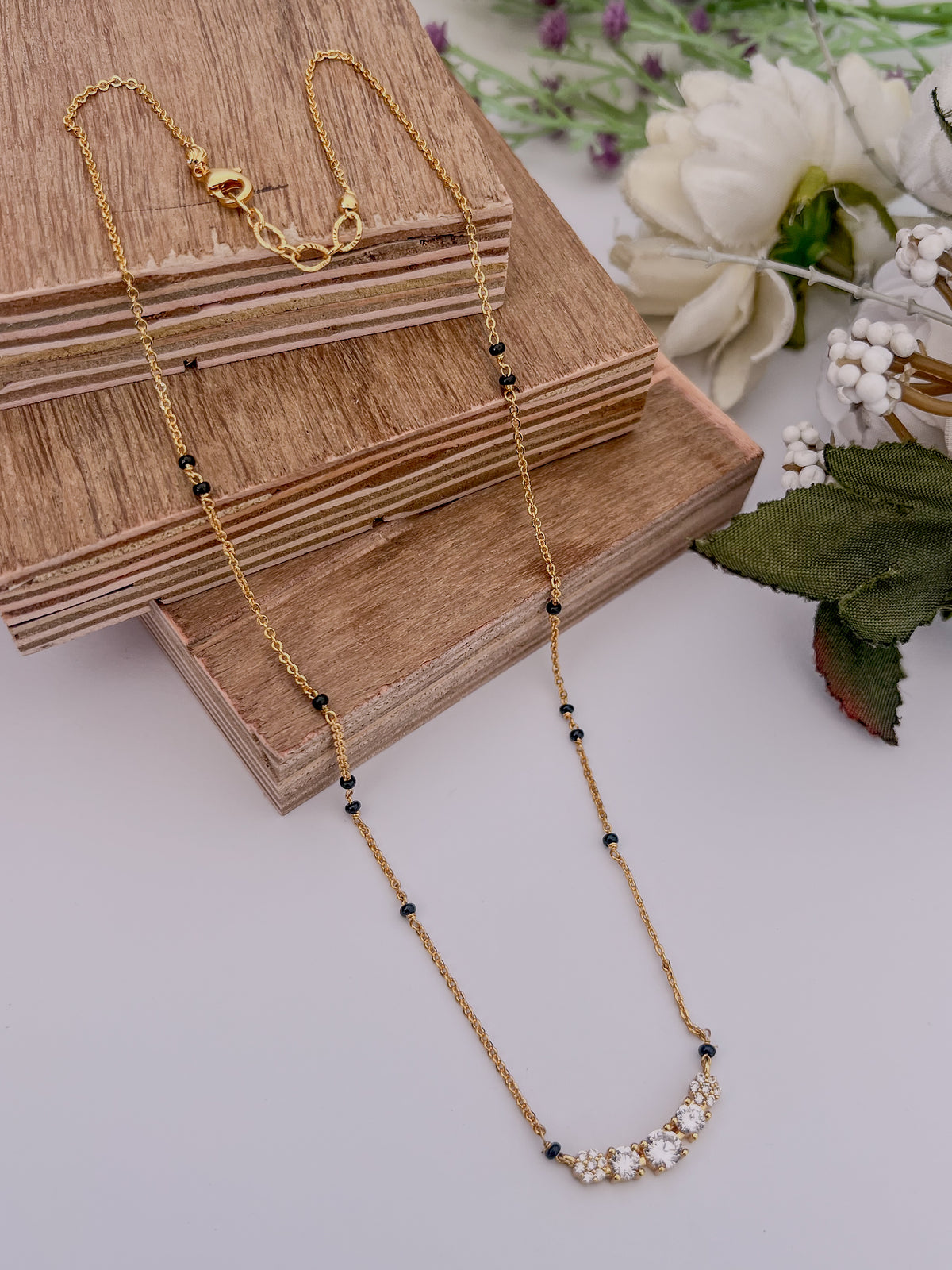 Five-Stone Black Bead Mangalsutra with Graduated Solitaire Centre
