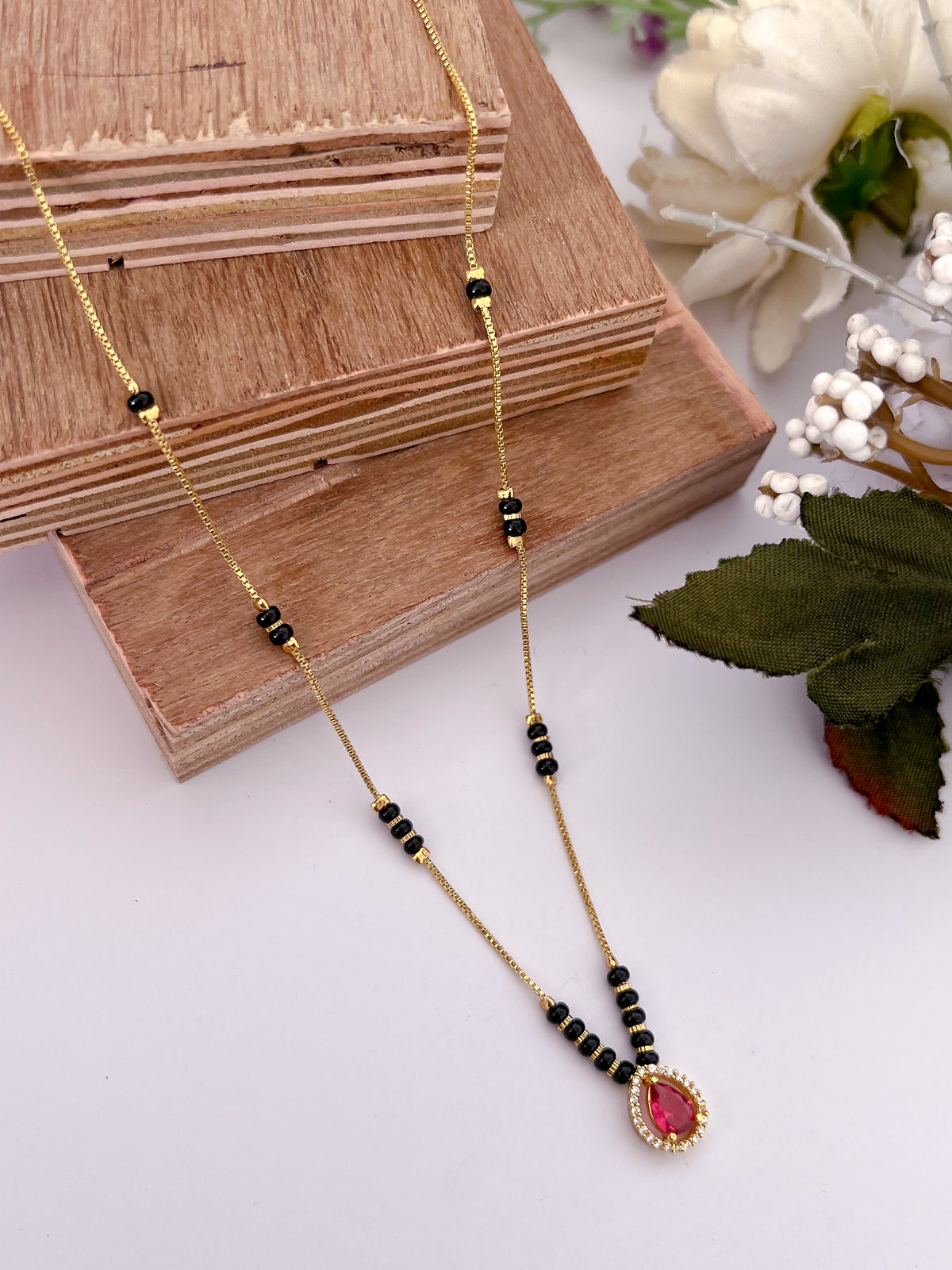 Ruby Teardrop Black Bead Mangalsutra with Halo Pendant