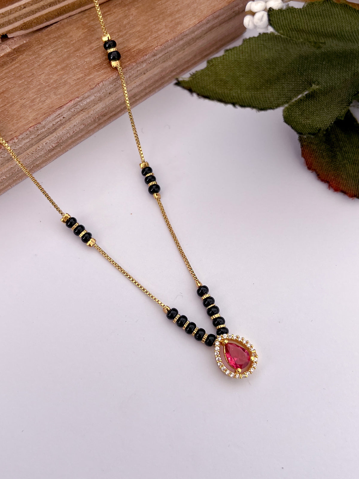 Ruby Teardrop Black Bead Mangalsutra with Halo Pendant