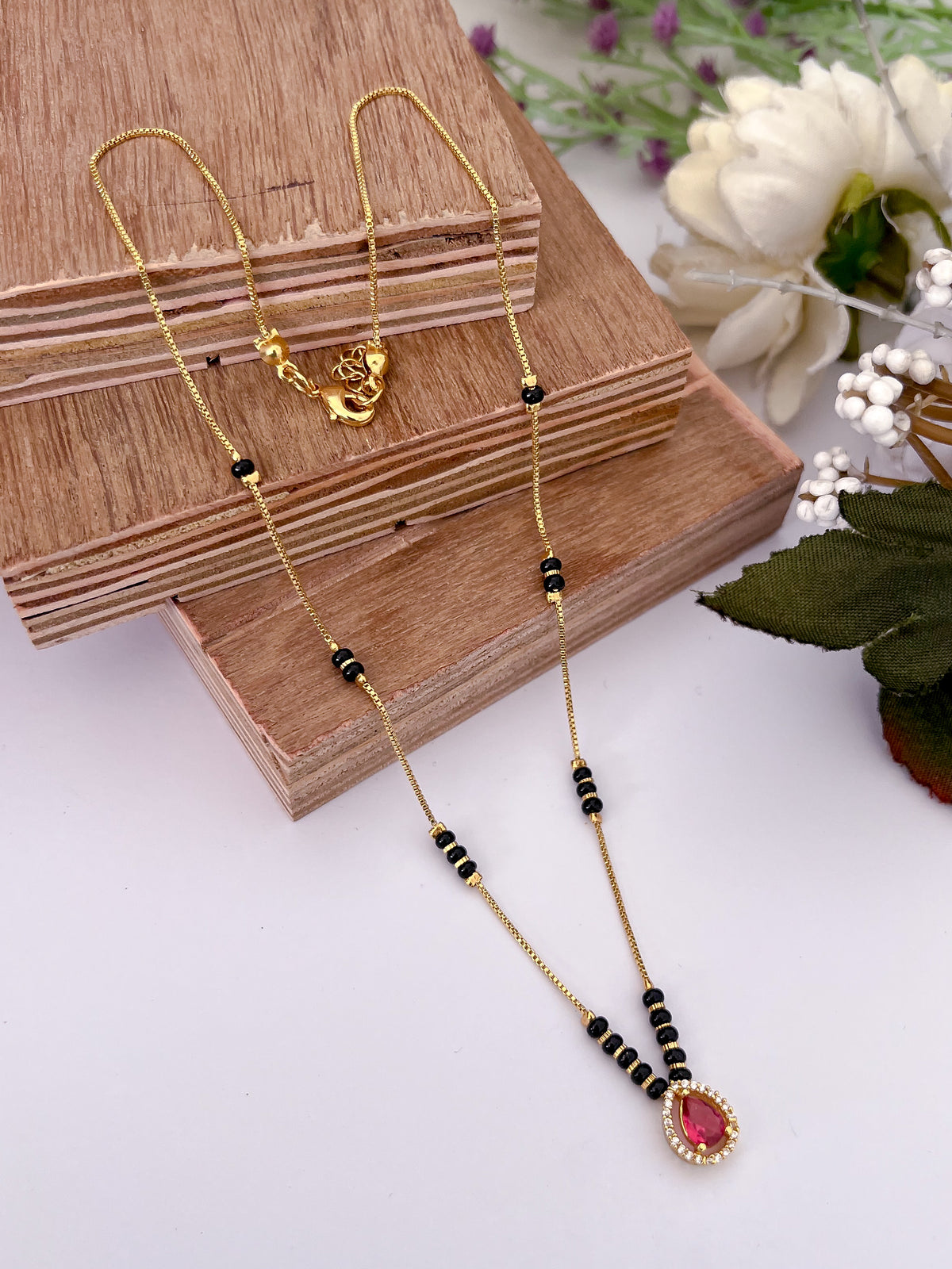 Ruby Teardrop Black Bead Mangalsutra with Halo Pendant