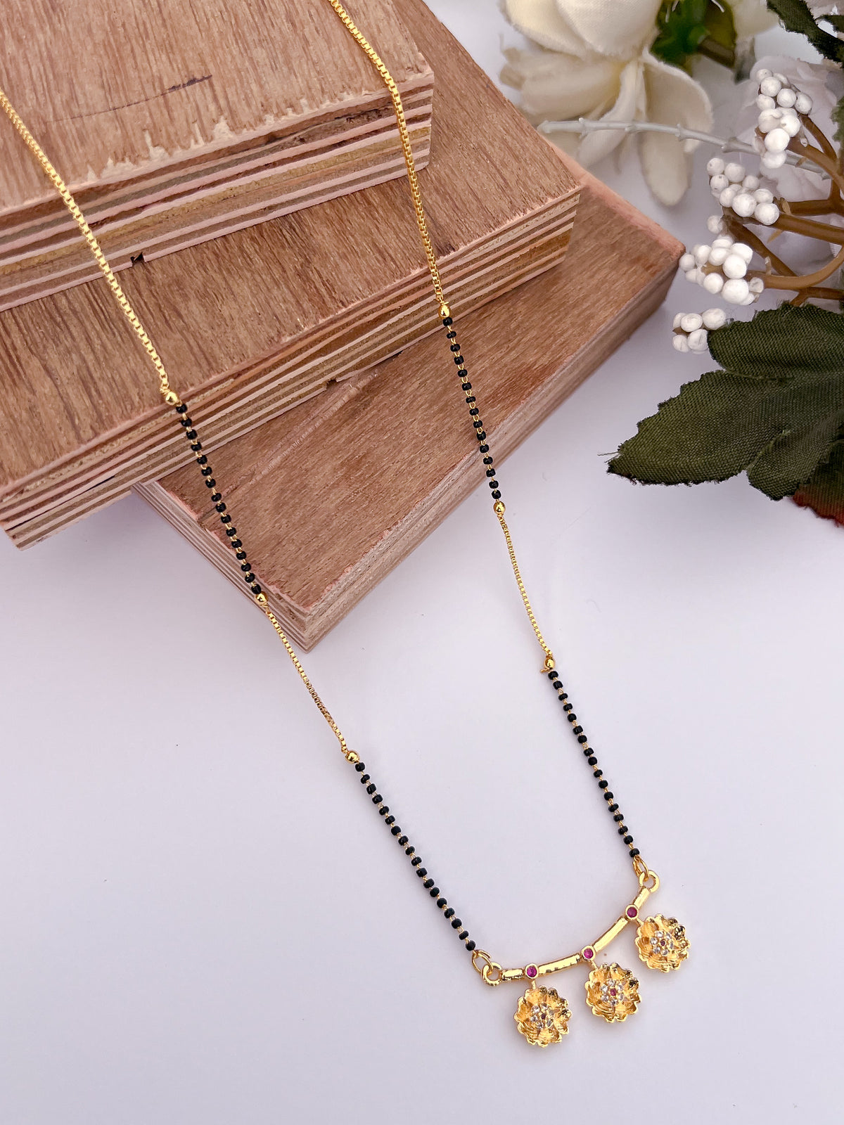 Floral Drop Black Bead Mangalsutra with Pink Stone Accents